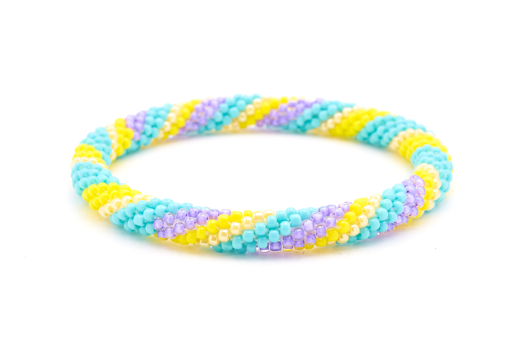 Handmade Beaded friendship bracelet with turquoise, yellow, and purple glass beads. Crafted by artisans in Nepal for Sashka Co. 