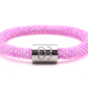 Sashka Co. Pink w/ Silver BFF Charm Bracelet. Handmade glass bead bracelet from Nepal, featuring a roll design.