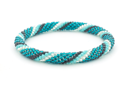 Sashka Co. teal, turquoise, Black, Clear Aqua Nightfall Bracelet. Handmade glass bead bracelet from Nepal, featuring a roll design.
 