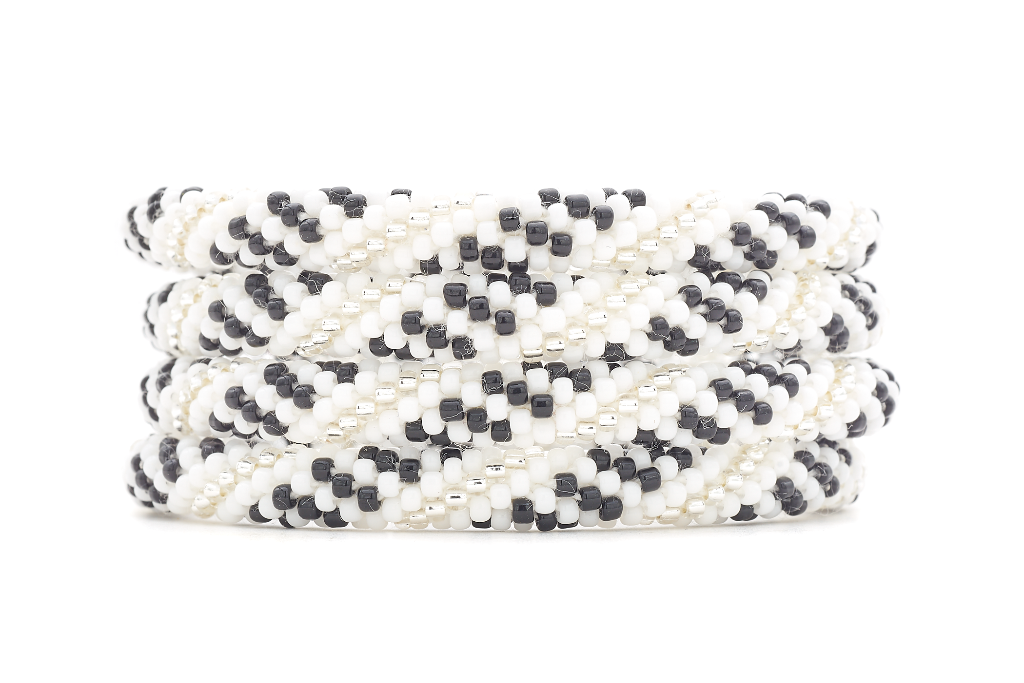 Sashka Co. white, clear, black Arctic Midnight Bracelet. Handmade glass bead bracelet from Nepal, featuring a roll design.