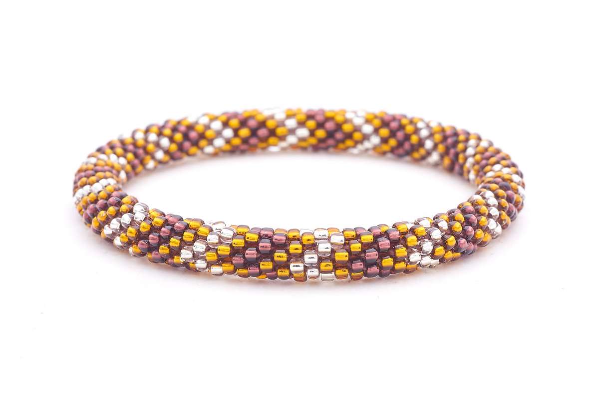 Sashka Co. handmade glass beaded friendship bracelet with amber, plum, and silver glass beads in a chevron pattern. Crafted in Nepal by skilled artisans.