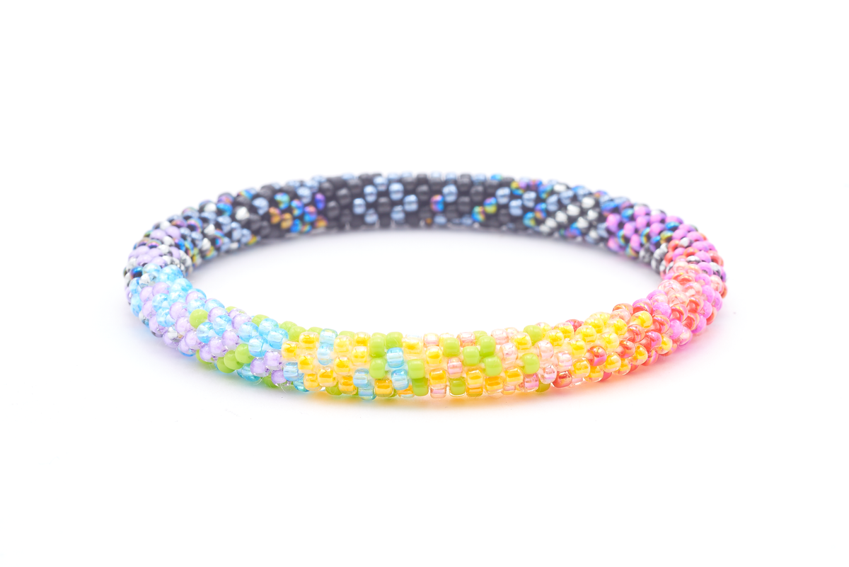 Sashka Co. handmade glass beaded friendship bracelet with black, matte black, iridescent, silver, pink, red, coral, yellow, green, blue, and purple glass beads in a confetti mixed pattern. Crafted in Nepal by skilled artisans.