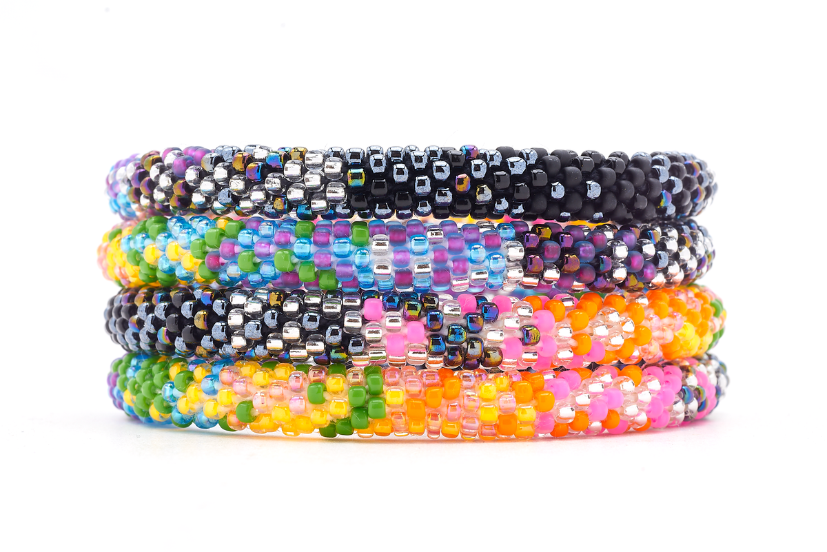 Sashka Co handmade beaded friendship bracelet with black, silver, orange, green, pink, blue, and purple glass beads. Crafted in Nepal by skilled artisans.