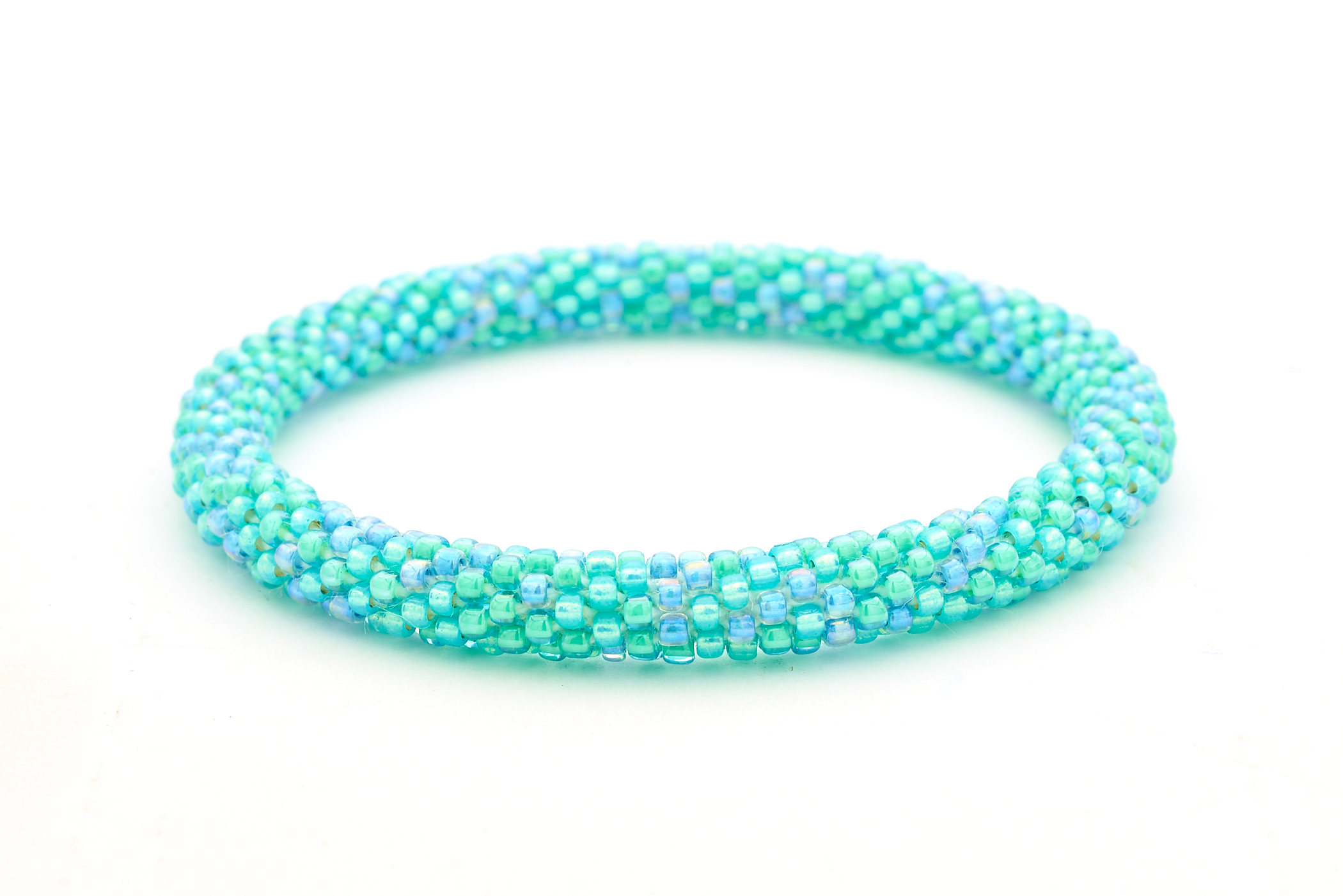 Sashka Co handmade beaded friendship bracelet with blue and aqua glass beads. Crafted in Nepal by skilled artisans.