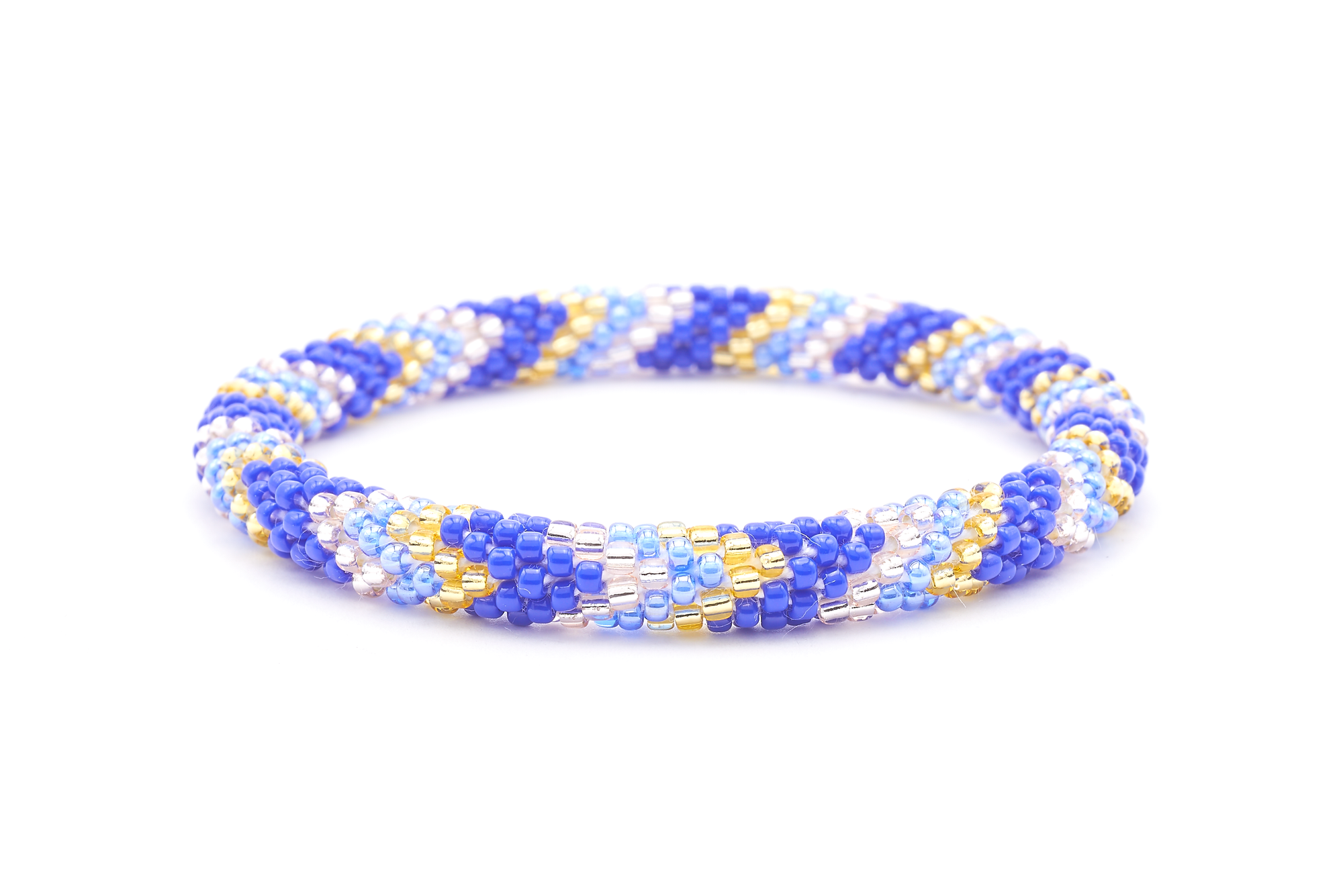 Sashka Co. handmade glass beaded friendship bracelet with blue, champagne gold, and rose gold glass beads. Crafted in Nepal by skilled artisans.