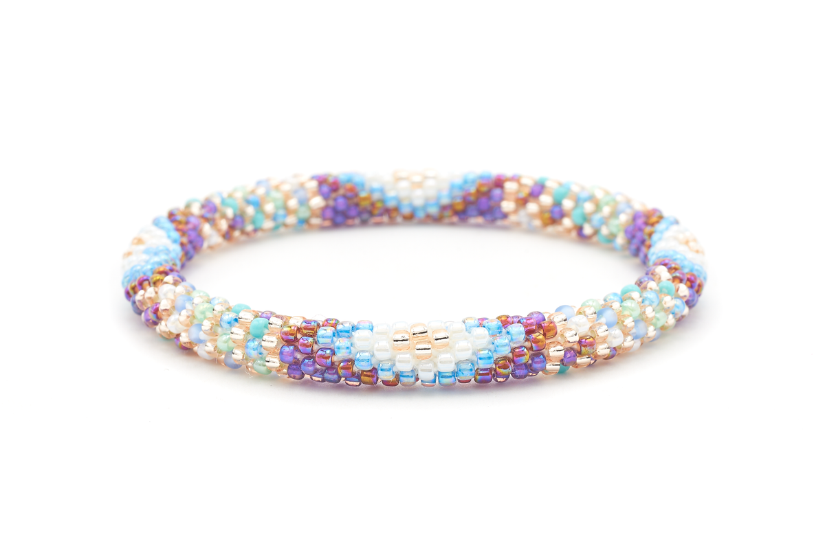 Sashka Co. handmade glass beaded friendship bracelet with blue, iridescent red, purple, white, rose gold, turquoise, mint, and diamond glass beads. Crafted in Nepal by skilled artisans.