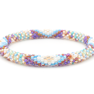 Sashka Co. handmade glass beaded friendship bracelet with blue, iridescent red, purple, white, rose gold, turquoise, mint, and diamond glass beads. Crafted in Nepal by skilled artisans.