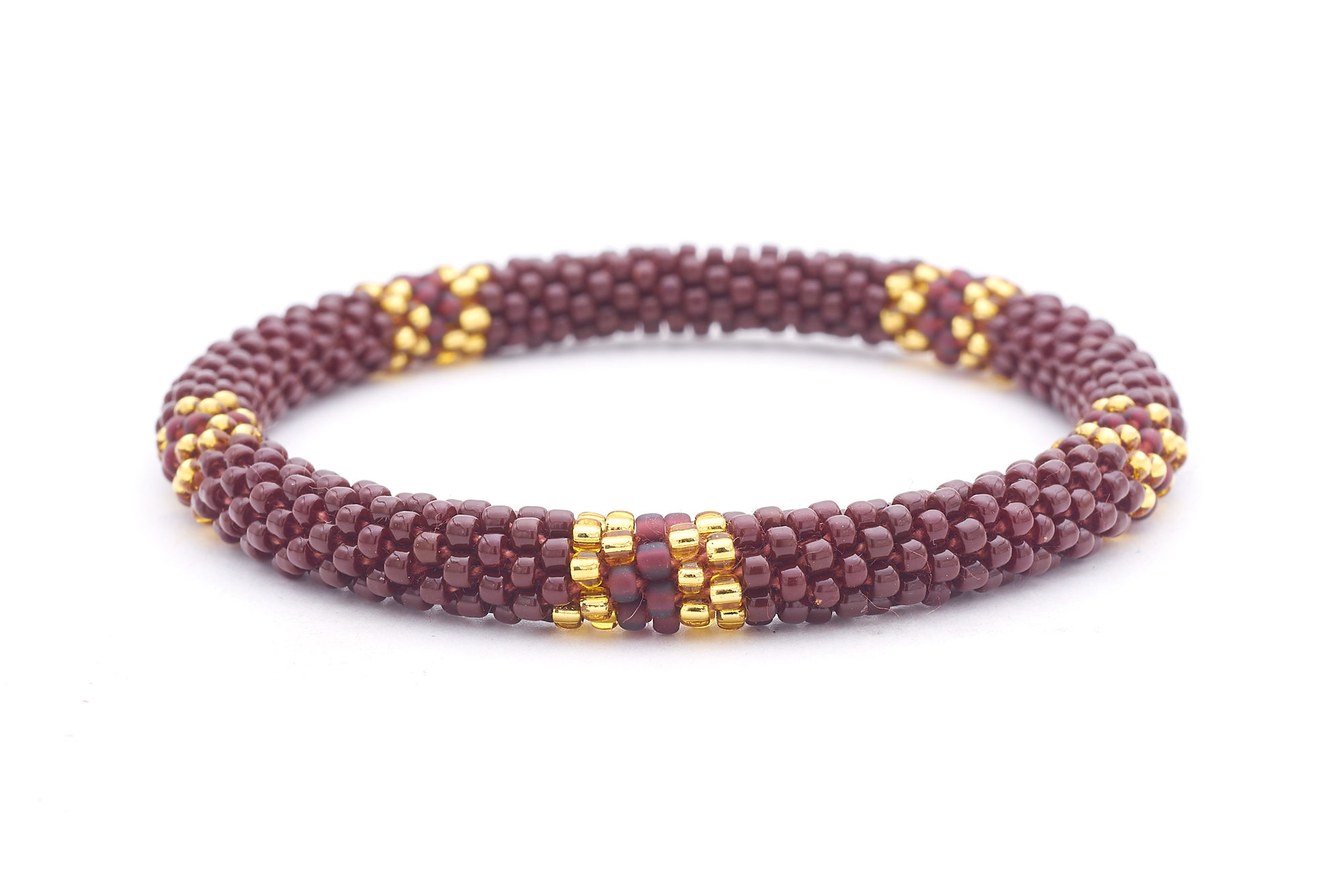 Sashka Co handmade beaded friendship bracelet with brown, champagne gold, and matte plum glass beads. Crafted in Nepal by skilled artisans.