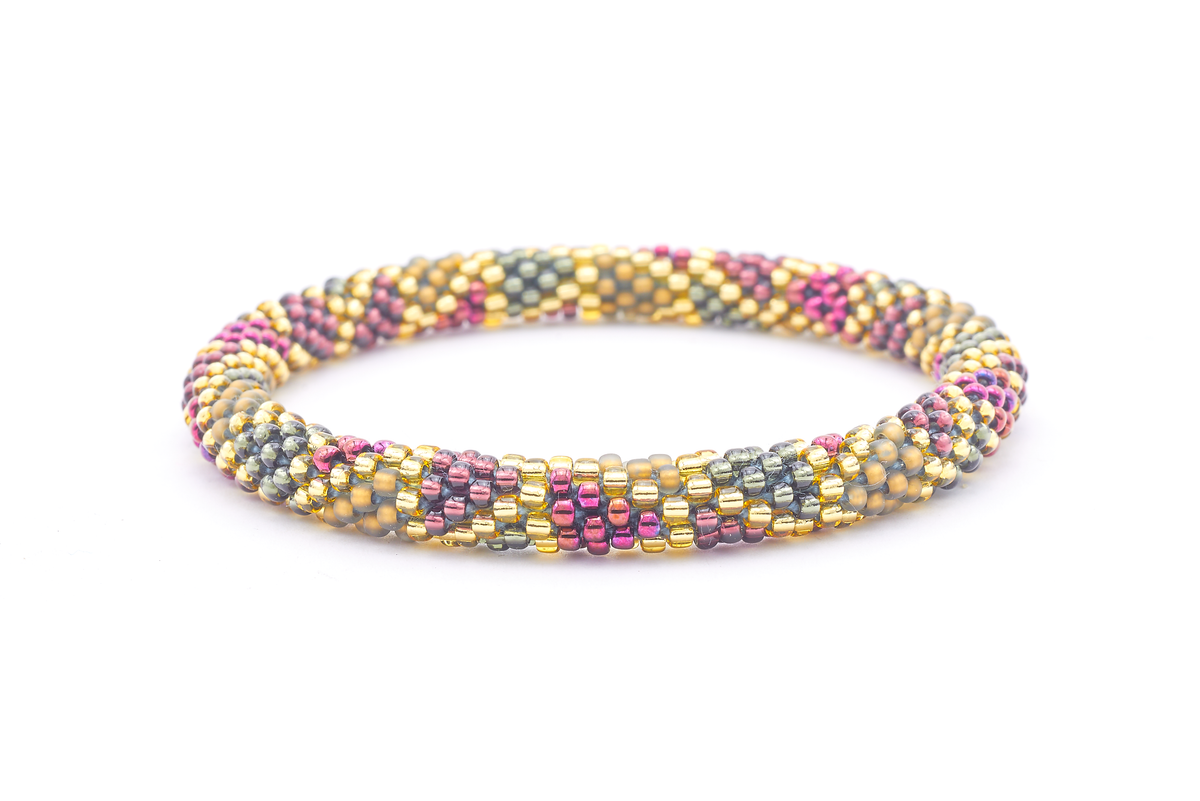 Sashka Co. handmade glass beaded friendship bracelet with champagne gold, plum, matte golden brown, silver, and plum wine glass beads. Crafted in Nepal by skilled artisans.