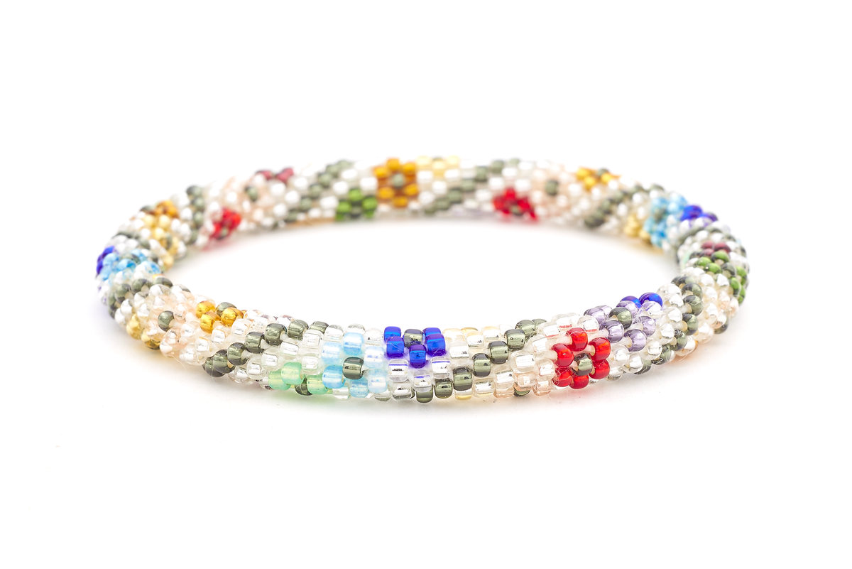 Sashka Co. handmade glass beaded friendship bracelet with clear, blue, green, red, purple, gold, rose gold, and silver glass beads in a flower and spiral pattern. Crafted in Nepal by skilled artisans.