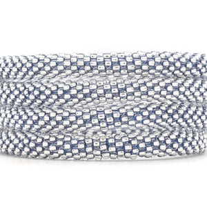 Sashka Co. handmade glass beaded friendship bracelet with clear beads and dark blue thread. Crafted in Nepal by skilled artisans.