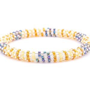 Sashka Co. handmade glass beaded friendship bracelet with clear, gold, iridescent, and yellow glass beads. Crafted in Nepal by skilled artisans.