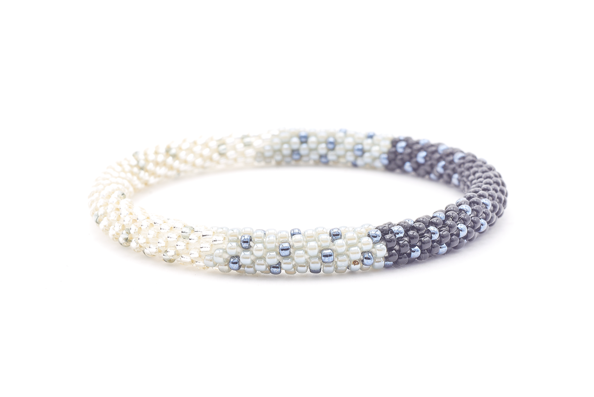Sashka Co. handmade glass beaded friendship bracelet with clear, gray, silver, and black glass beads. Crafted in Nepal by skilled artisans.