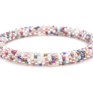 Sashka Co. handmade glass beaded friendship bracelet with clear, matte mauve, matte gray, iridescent mauve, and iridescent plum glass beads. Crafted in Nepal by skilled artisans.