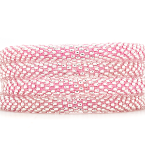 Sashka Co handmade beaded friendship bracelet with clear glass beads and pink thread. Crafted in Nepal by skilled artisans.