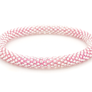 Sashka Co handmade beaded friendship bracelet with clear glass beads and pink thread. Crafted in Nepal by skilled artisans.