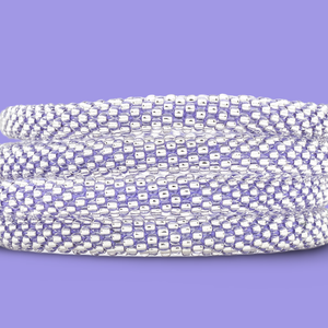 Sashka Co handmade beaded friendship bracelet with clear glass beads and purple thread. Crafted in Nepal by skilled artisans.