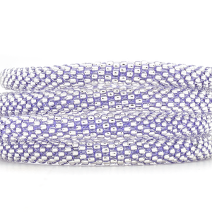 Sashka Co handmade beaded friendship bracelet with clear glass beads and purple thread. Crafted in Nepal by skilled artisans.