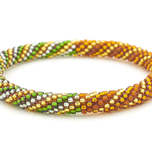 Sashka Co. handmade glass beaded friendship bracelet with green, brown, gold, and silver glass beads in a spiral pattern. Crafted in Nepal by skilled artisans.