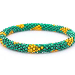 Sashka Co. handmade beaded friendship bracelet with green and gold glass beads. Crafted in Nepal by skilled artisans in a patterned design.