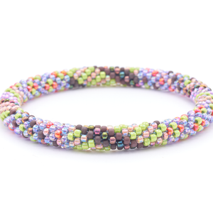 Sashka Co. handmade beaded friendship bracelet with green, iridescent, purple, brown, and orange glass beads. Crafted in Nepal by skilled artisans in a spiral confetti pattern.
