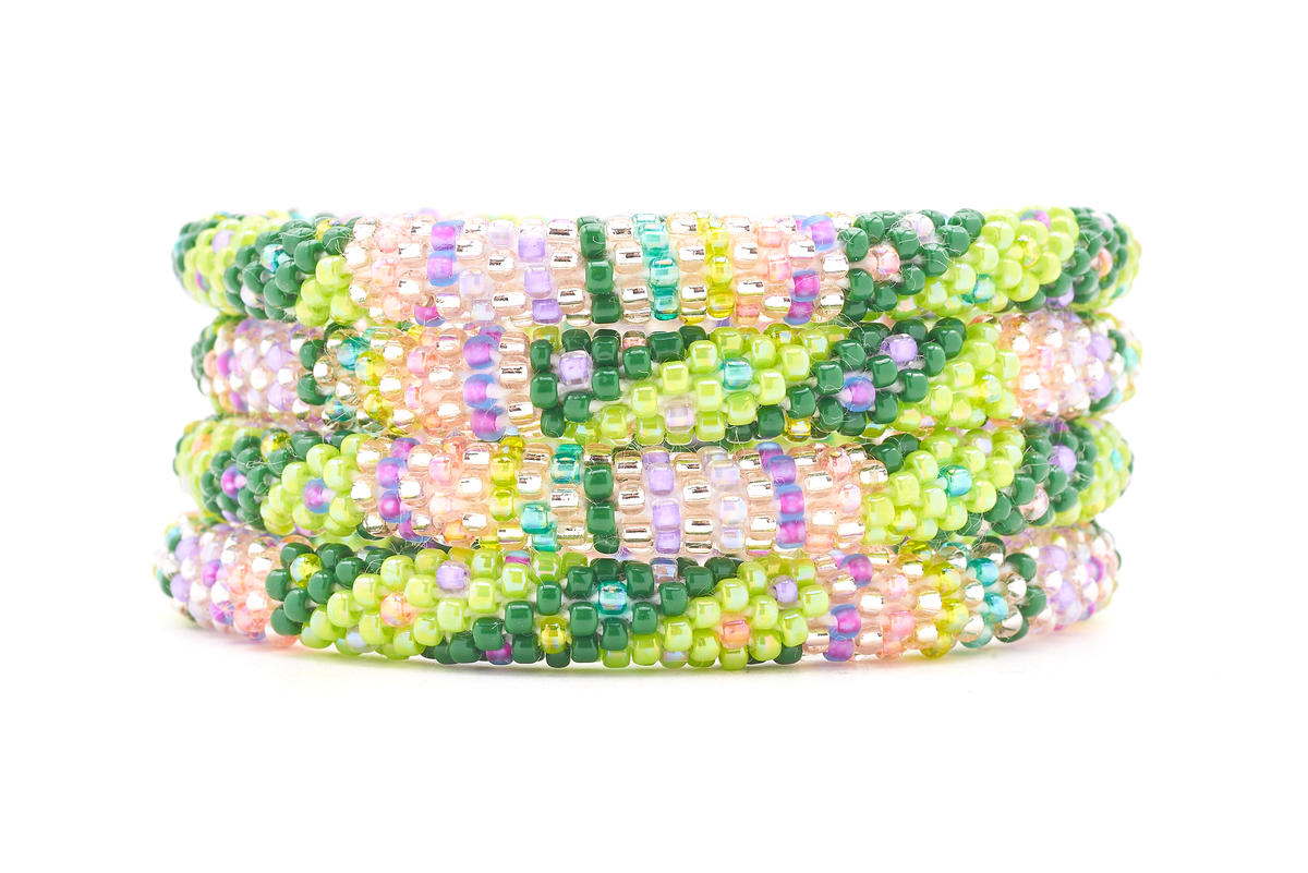 Sashka Co. Green, Light Green, Rose Gold, Purple, Peach Bracelet. Handmade glass bead bracelet from Nepal, featuring a roll design.
 