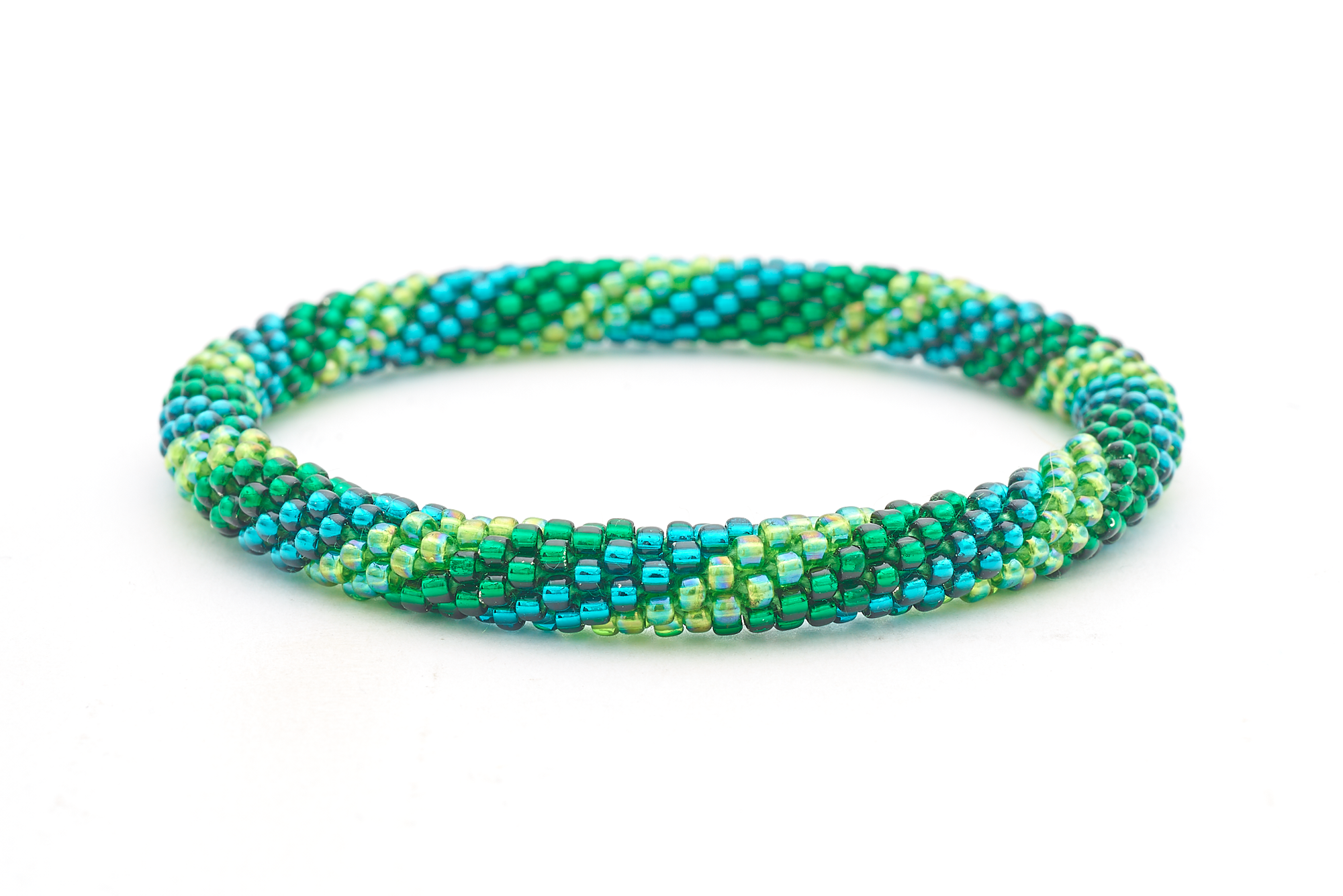 Sashka Co handmade beaded friendship bracelet with green and teal glass beads in a spiral pattern. Crafted in Nepal by skilled artisans.