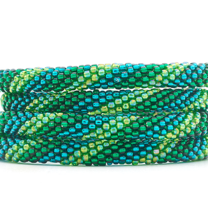 Sashka Co handmade beaded friendship bracelet with green and teal glass beads in a spiral pattern. Crafted in Nepal by skilled artisans.

