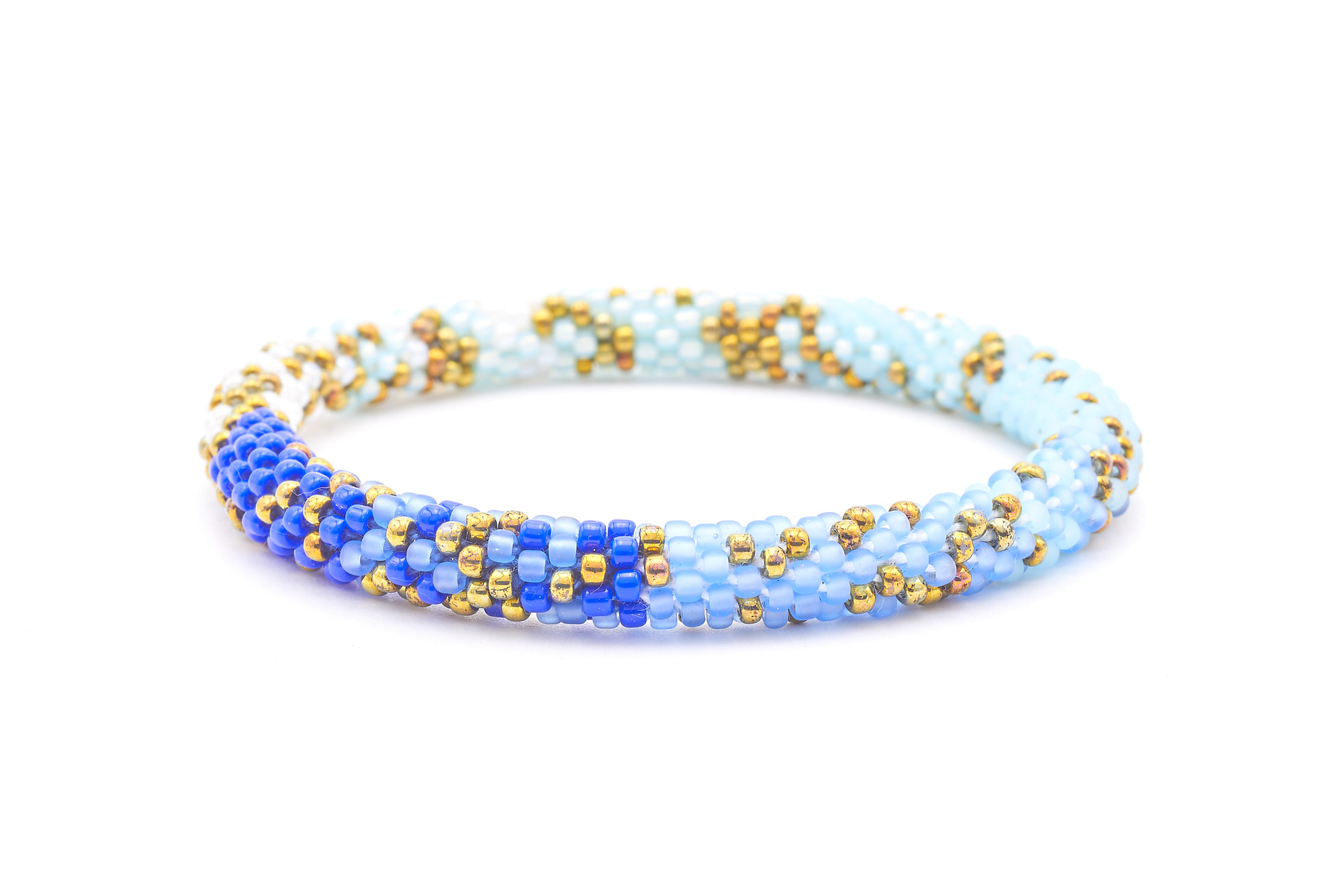 Sashka Co. handmade glass beaded friendship bracelet with iridescent bronze, blue, matte periwinkle, matte light blue, and white glass beads. Crafted in Nepal by skilled artisans.