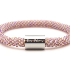 Sashka Co. Iridescent Mauve w/ Silver Best Friend Charm Bracelet. Handmade glass bead bracelet from Nepal, featuring a roll design.
 
