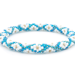 Sashka Co. handmade glass beaded friendship bracelet with iridescent teal, white, and iridescent bronze glass beads. Crafted in Nepal by skilled artisans.