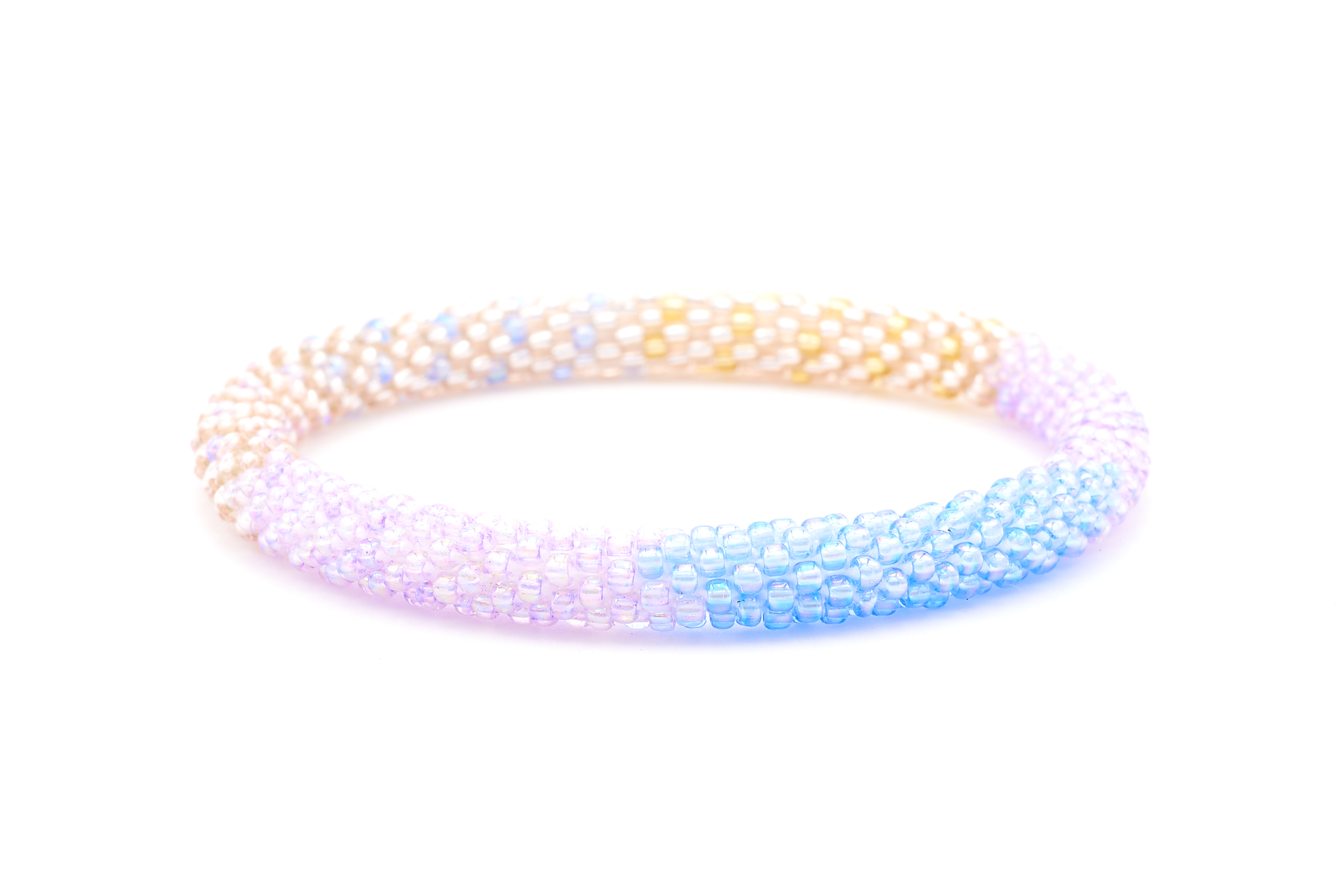 Sashka Co. handmade glass beaded friendship bracelet with lavender, purple, rose gold, and champagne gold glass beads. Crafted in Nepal by skilled artisans.