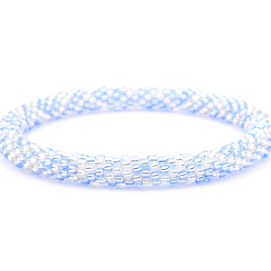 Sashka Co. handmade glass beaded friendship bracelet with light blue and clear glass beads. Crafted in Nepal by skilled artisans.