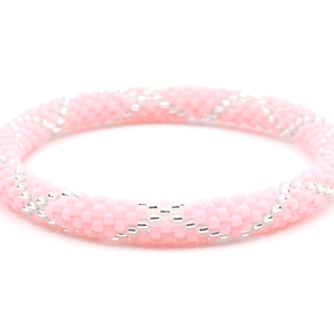 Sashka Co. handmade glass beaded friendship bracelet with light pink and clear glass beads. Crafted in Nepal by skilled artisans.