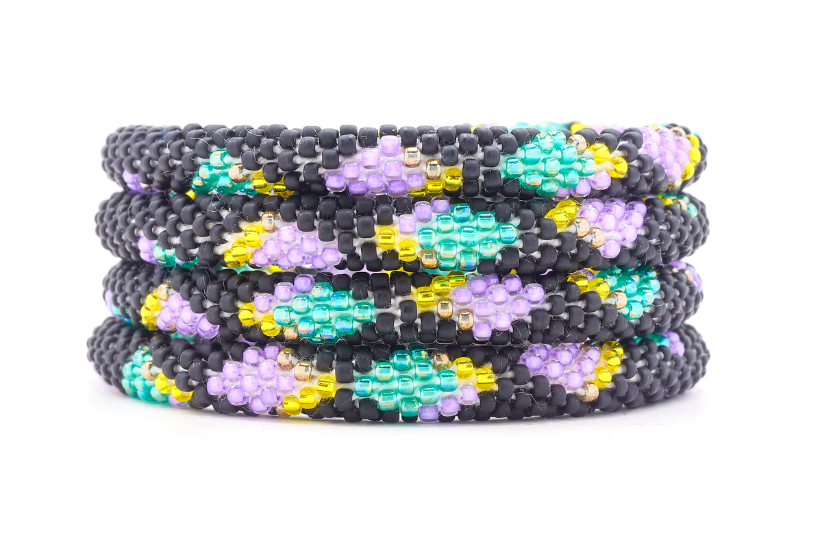 Sashka Co. Matte Black, Purple, Teal, Yellow Bracelet. Handmade glass bead bracelet from Nepal, featuring a roll design.