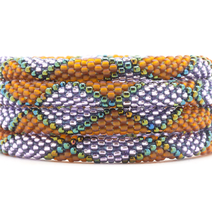 Sashka Co. handmade glass beaded friendship bracelet with matte brown, iridescent, and purple glass beads. Crafted in Nepal by skilled artisans.
