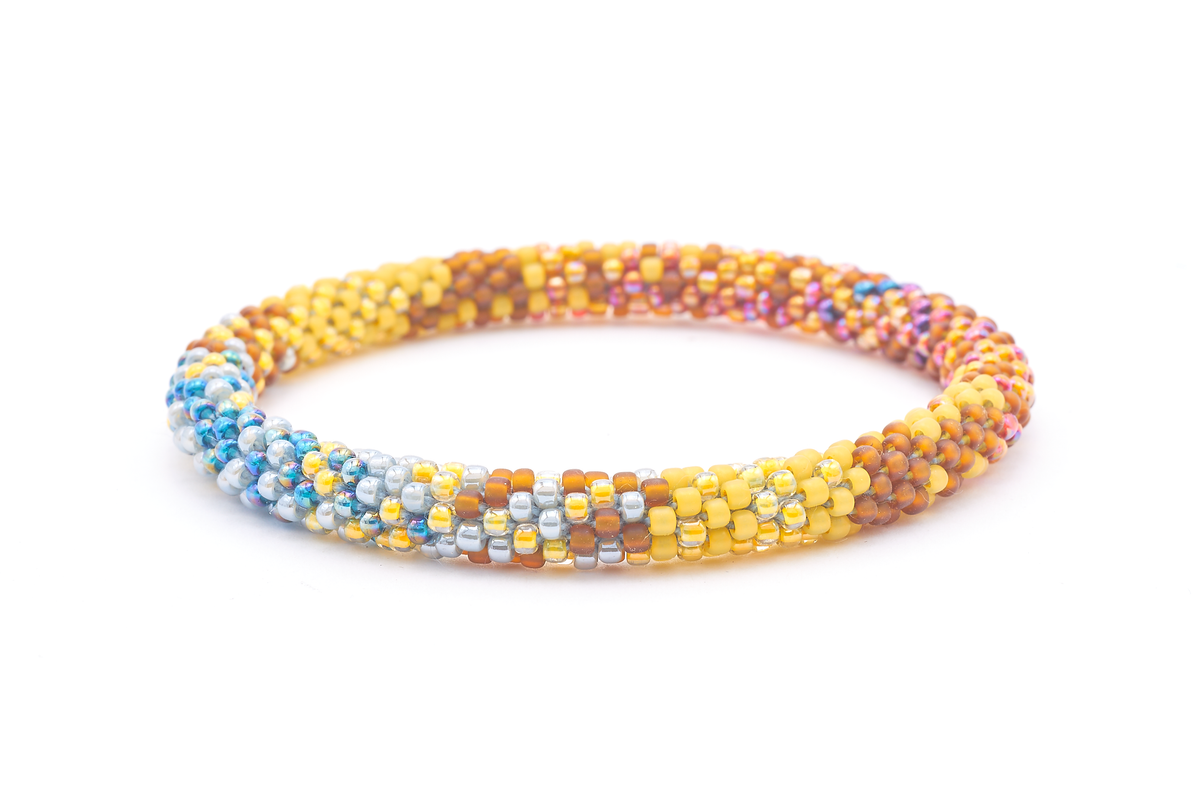 Sashka Co. handmade glass beaded friendship bracelet with matte brown, matte yellow, yellow, gray, and iridescent clear, pink, orange, and purple glass beads in a mixed pattern. Crafted in Nepal by skilled artisans.
