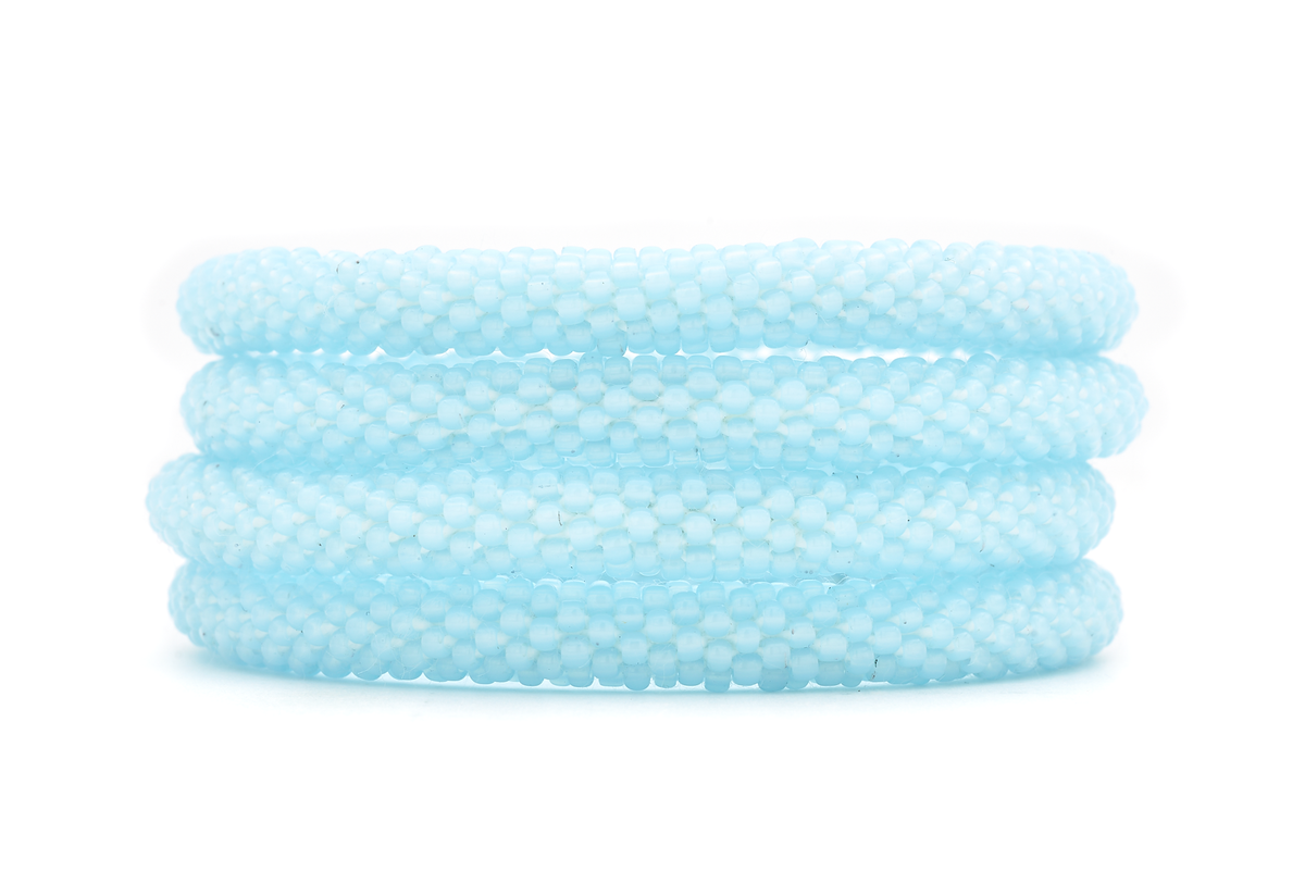 Handmade beaded friendship bracelet with matte light blue glass beads. Crafted by artisans in Nepal for Sashka Co.