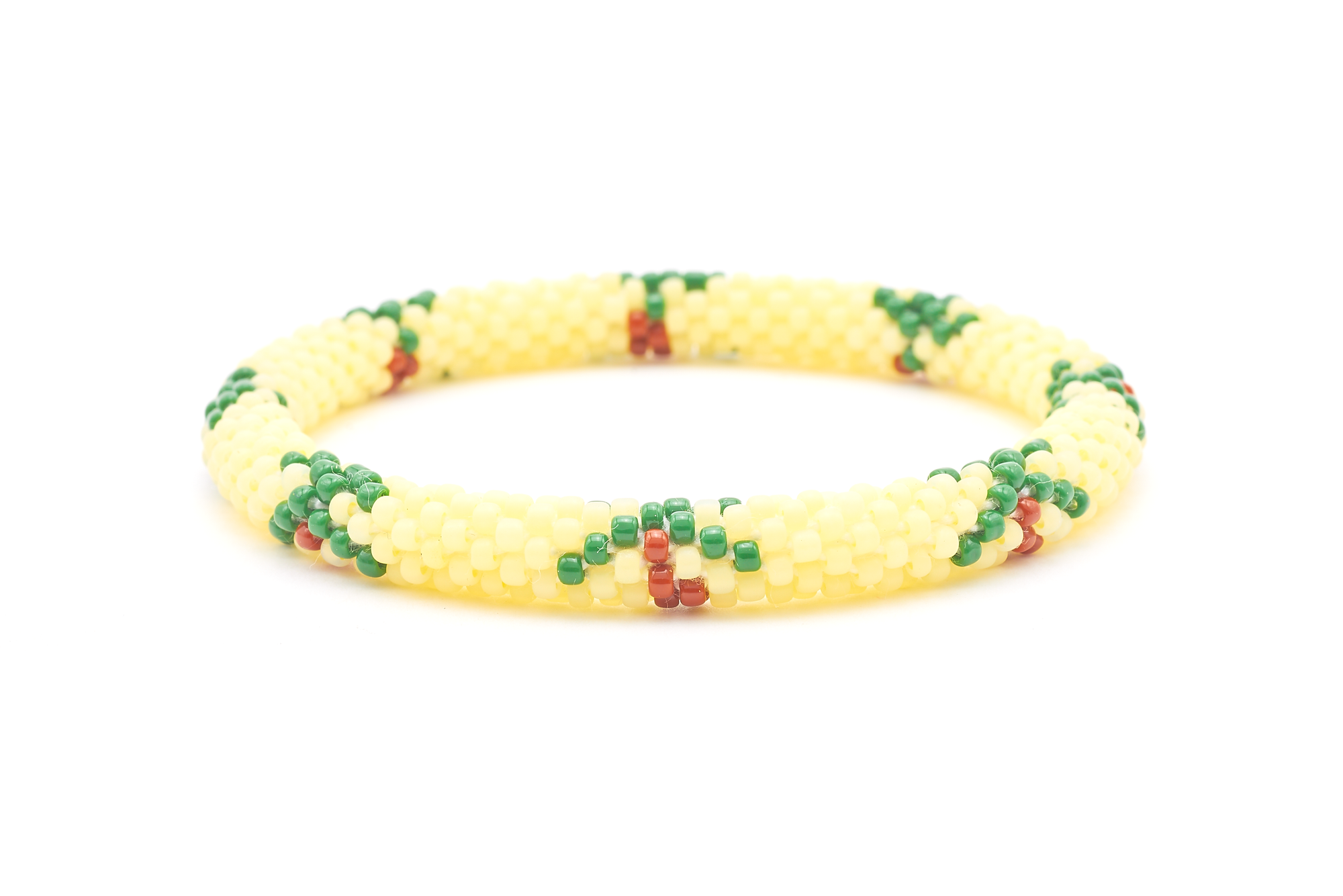 Sashka Co. handmade glass beaded friendship bracelet with matte light yellow, brown, and green glass beads. Crafted in Nepal by skilled artisans.
