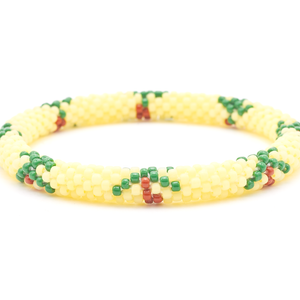 Sashka Co. handmade glass beaded friendship bracelet with matte light yellow, brown, and green glass beads. Crafted in Nepal by skilled artisans.