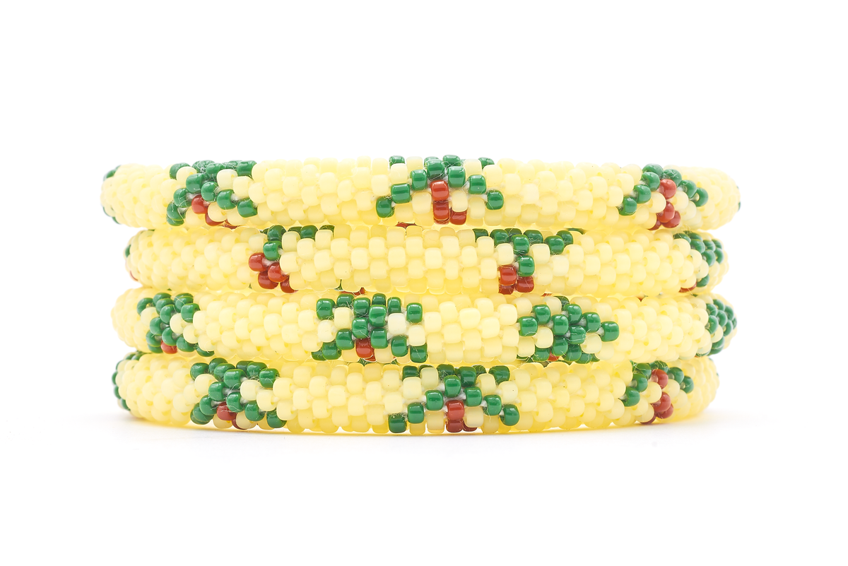 Sashka Co. handmade glass beaded friendship bracelet with matte light yellow, brown, and green glass beads. Crafted in Nepal by skilled artisans.