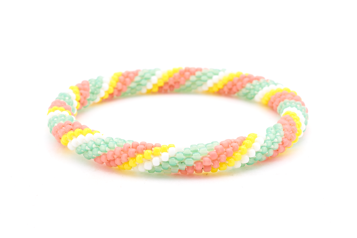 Sashka Co. Mint, Coral, Yellow, white Bracelet. Handmade glass bead bracelet from Nepal, featuring a roll design.
 