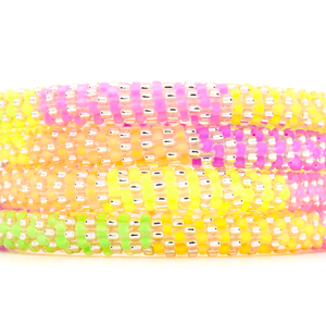 Handmade beaded friendship bracelet with neon yellow, green, orange, pink, purple, and rose gold glass beads. Crafted by artisans in Nepal for Sashka Co.
