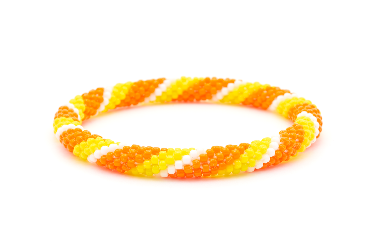 Sashka Co. handmade beaded friendship bracelet with orange, yellow, and white glass beads. Crafted in Nepal by skilled artisans in a spiral pattern.