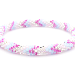 Sashka Co handmade beaded friendship bracelet with pink, blue, and clear glass beads. Crafted in Nepal by skilled artisans.