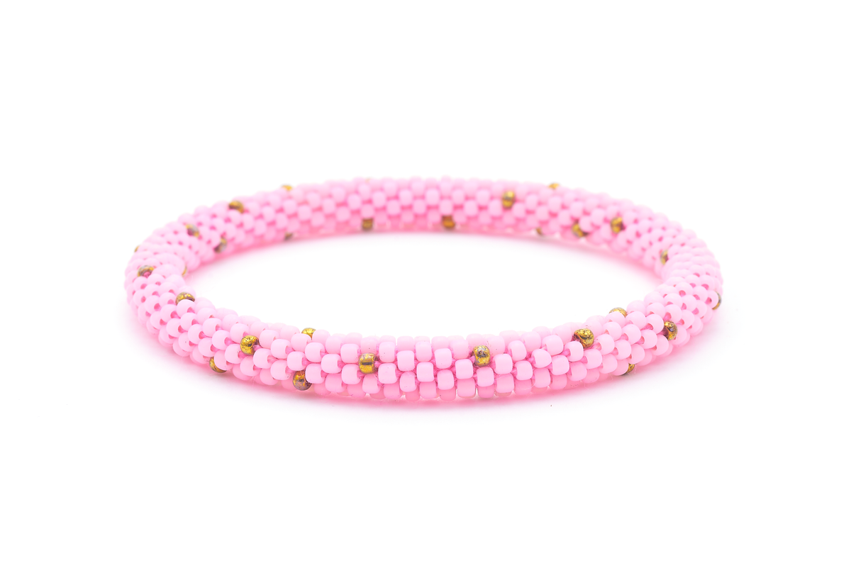 Sashka Co. handmade beaded friendship bracelet with pink and bronze glass beads. Crafted in Nepal by skilled artisans in a polka dot pattern.