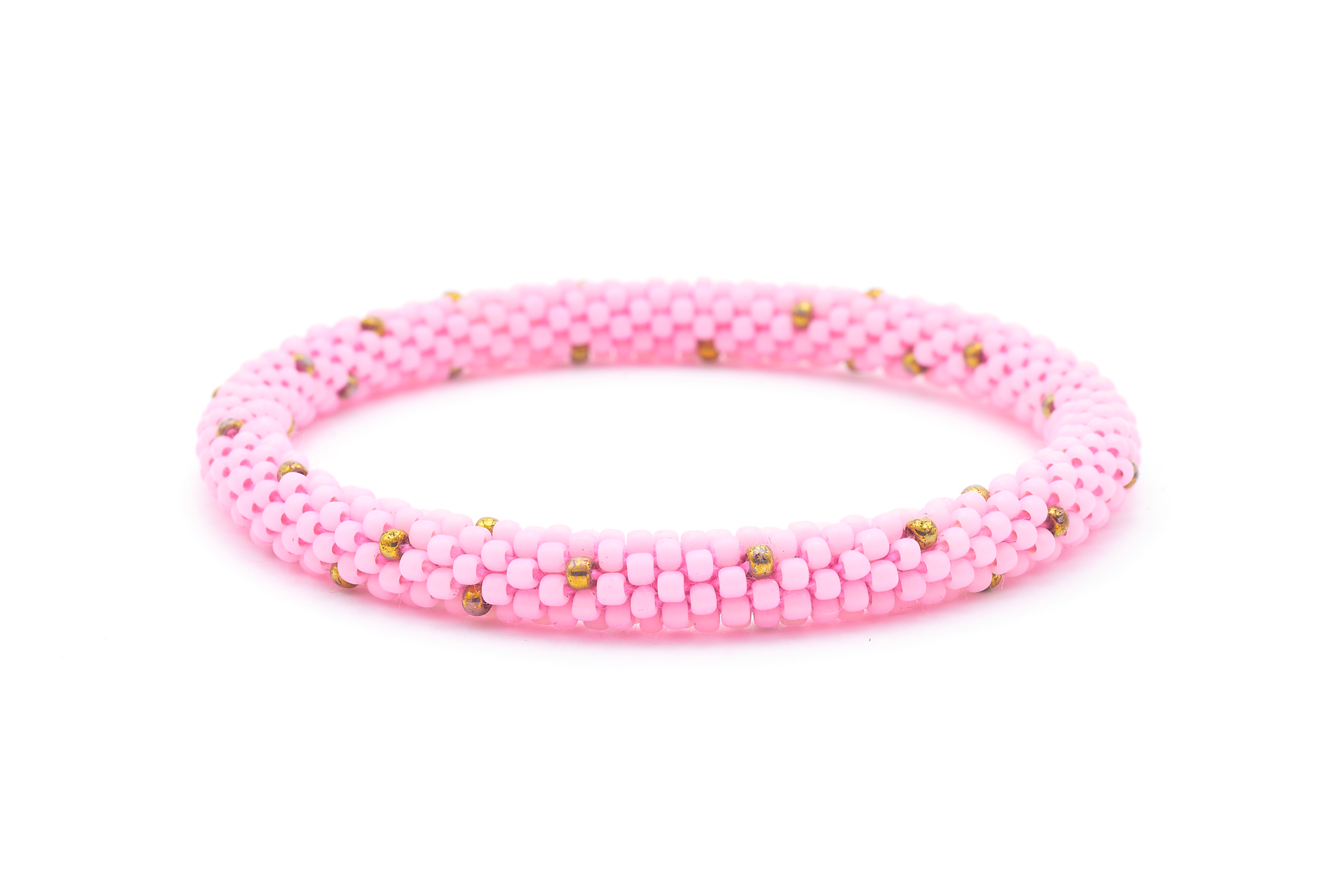 Sashka Co. handmade beaded friendship bracelet with pink and bronze glass beads. Crafted in Nepal by skilled artisans in a polka dot pattern.