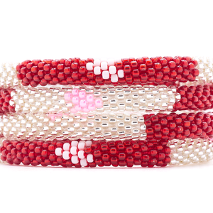 Sashka Co. handmade glass beaded friendship bracelet with pink, clear, white and red glass beads in a block heart pattern. Crafted in Nepal by skilled artisans.