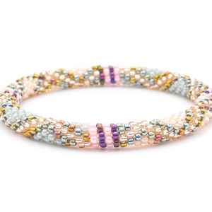 Sashka Co. handmade glass beaded friendship bracelet with pink, gray, iridescent purple, rose gold, silver, and gold glass beads. Crafted in Nepal by skilled artisans.