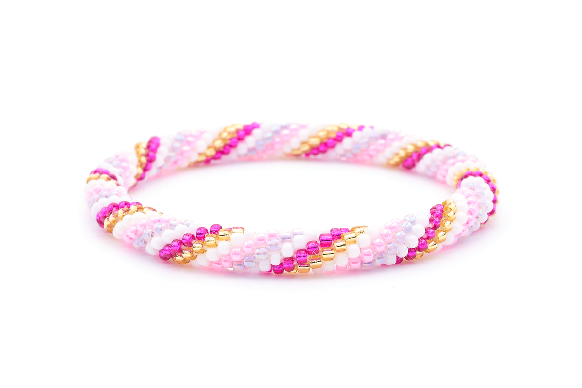 Sashka Co. handmade beaded friendship bracelet with pink, white, fuchsia, champagne gold, and light iridescent purple glass beads. Crafted in Nepal by skilled artisans in a spiral pattern.